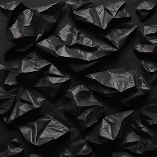 crumpled black paper