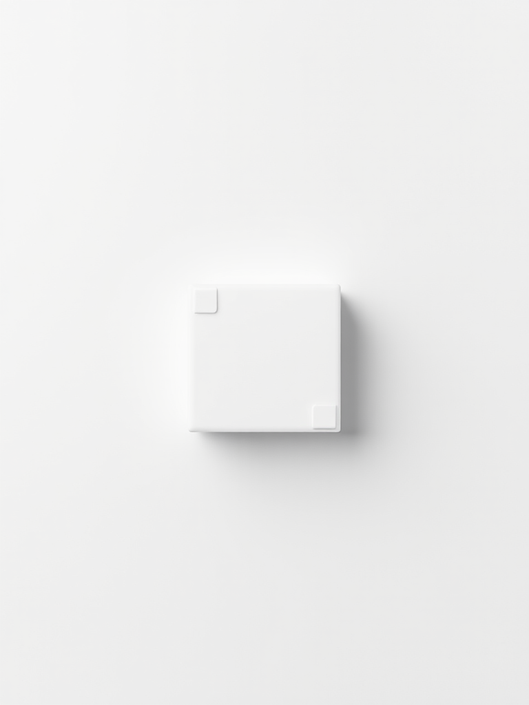 Generate a high-contrast black and white image of a simple geometric shape against a clean background, using a DSLR camera with a 50mm lens, aperture f/1.8, ISO 100, and a view from a 45-degree angle to enhance clarity and depth.