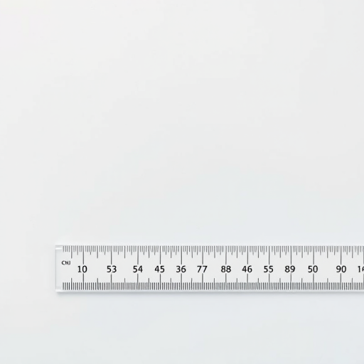 Create an image of a clear, simple straightedge ruler with a smooth gradient background transitioning from light blue to white, shot with a Canon EOS 5D Mark IV at f/8, ISO 100, 50mm lens, using a macro view for enhanced detail and clarity.