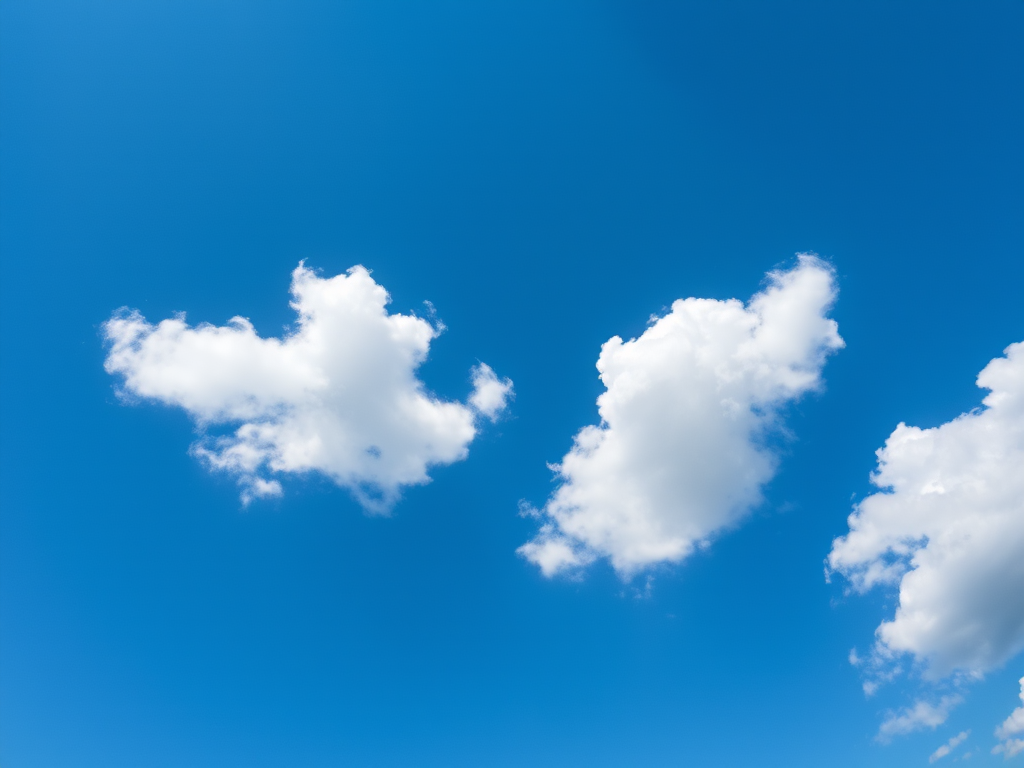 Create a serene blue sky scene with fluffy white clouds, taken with a DSLR camera at f/8, ISO 100, 1/200s, using a wide-angle lens for a crisp and clear perspective.